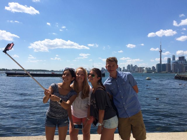 The Juniors posing at Toronto's beautiful waterfront (with a selfie stick, of course)