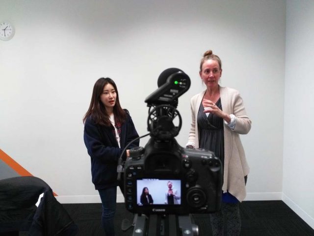 Yvonne with a student