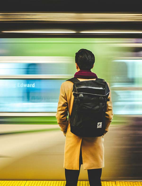 vancouver-skytrain-student-with-backpack