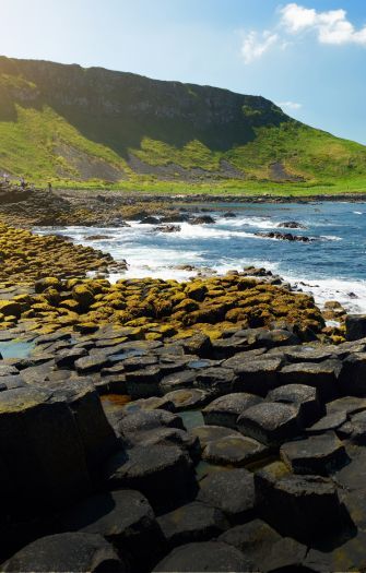 FULL-DAY EXCURSION: Giant's Causeway, Belfast and Dunluce Castle with Titanic Experience or Black Taxi Tour