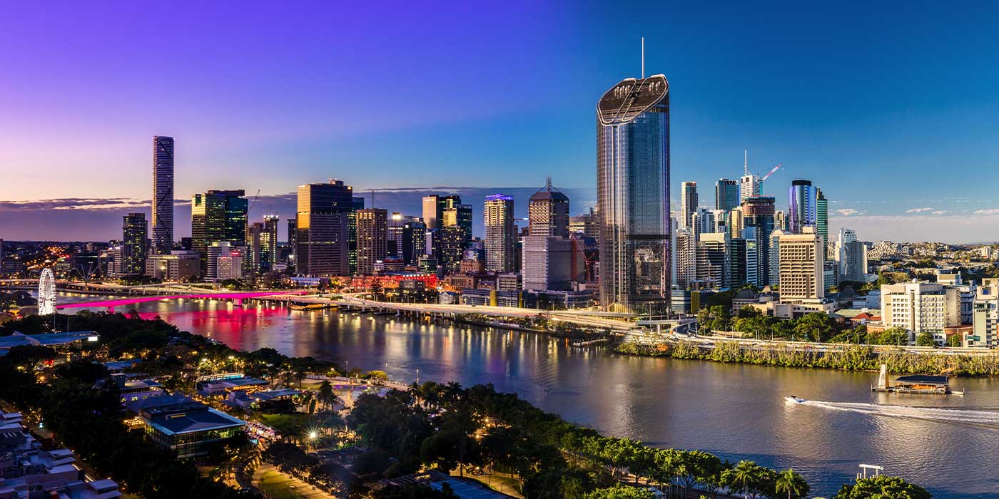 Brisbane city skyline at night - study, live, and work in Brisbane and take a VET program in Business