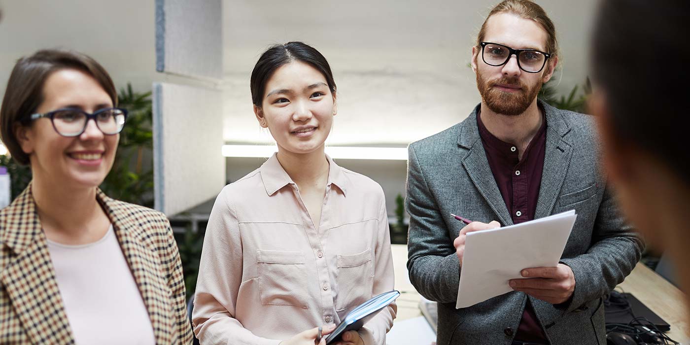 Three students dressed for work.  Work and study in Australia - international students typically have work rights included in their student visa